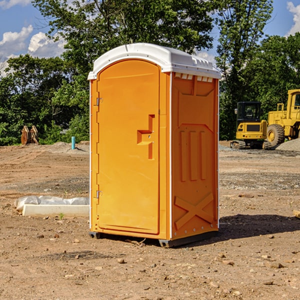 how often are the portable restrooms cleaned and serviced during a rental period in Telogia